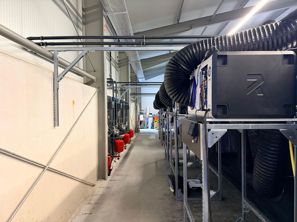 Climate units and ducting along a grow room corridor