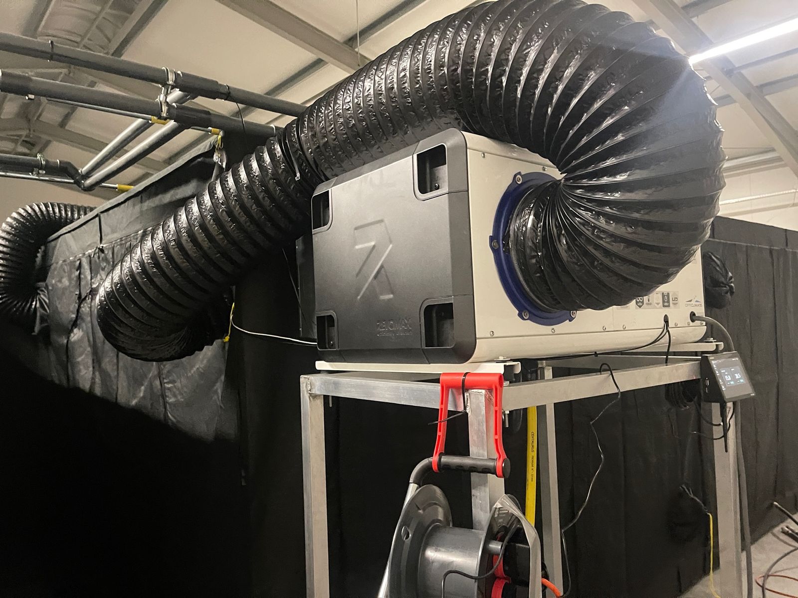 Climate unit with insulated ducting above grow tents